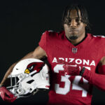Arizona Cardinals safety Jalen Thompson (34) poses for a photo during a photoshoot for the 2023 Arizona Cardinals Uniforms on Thursday, April 13, 2023.
