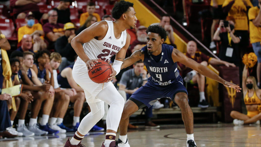 Arizona State Sun Devils forward Marcus Bagley (23) looks to pass defended by North Florida Ospreys...