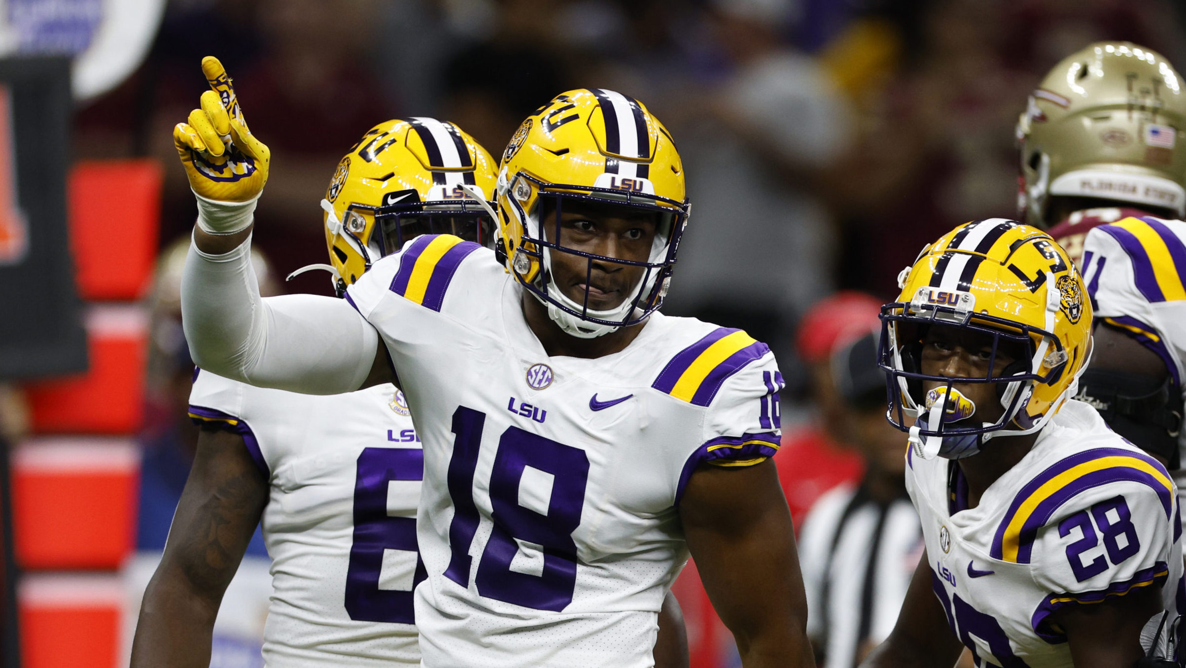 Defensive end BJ Ojulari #18 of the LSU Tigers reacts after a tackle against the Florida State Semi...