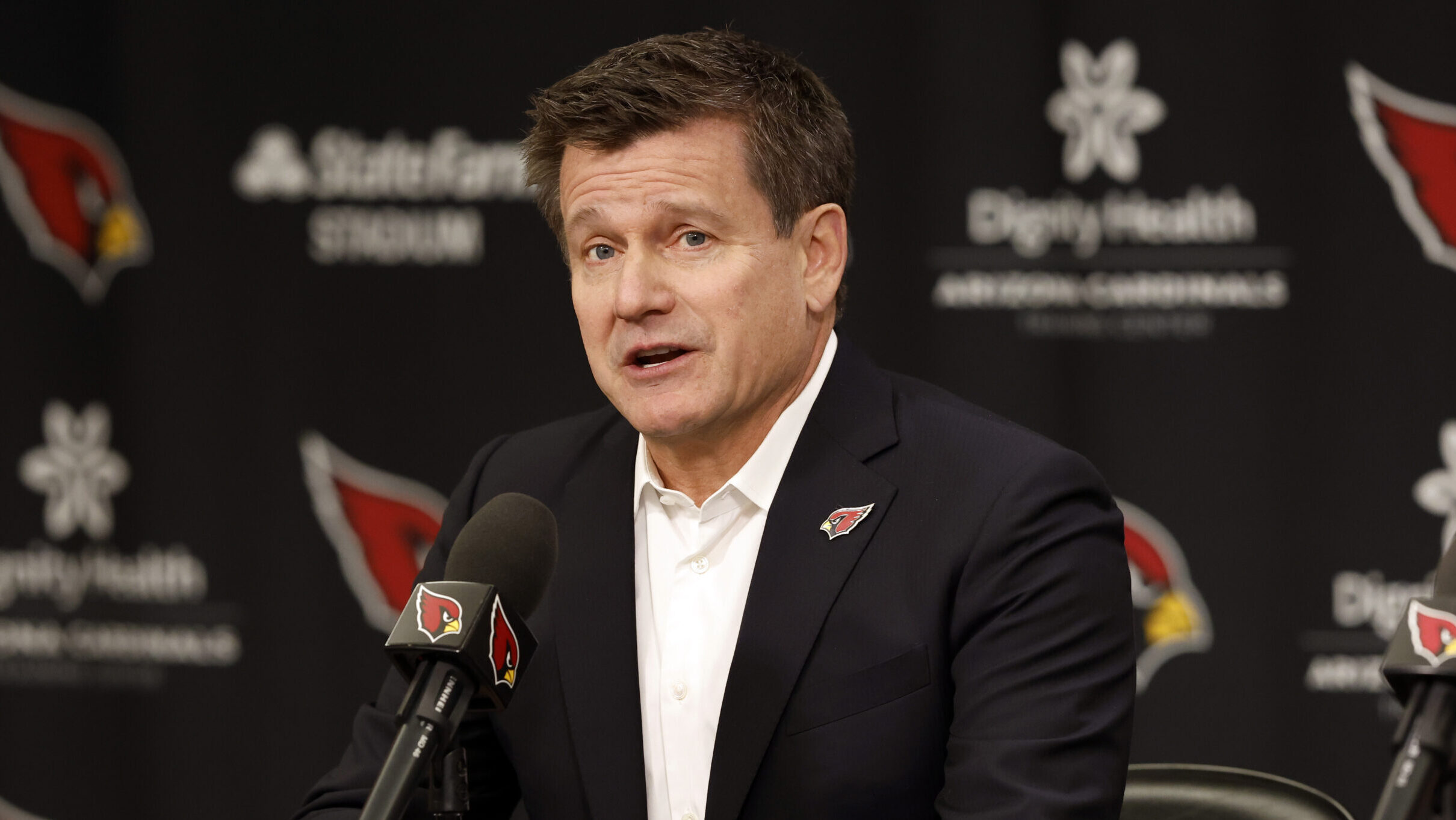 Owner Michael Bidwill of the Arizona Cardinals talks during a press conference introducing new head...
