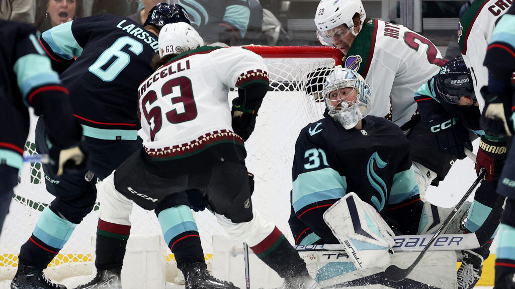 Philipp Grubauer #31 of the Seattle Kraken makes a save against the Arizona Coyotes during the seco...