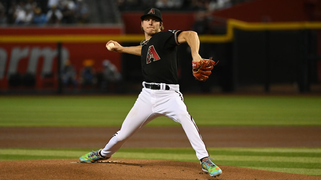 Drey Jameson #99 of the Arizona Diamondbacks delivers a first inning pitch against the Milwaukee Br...