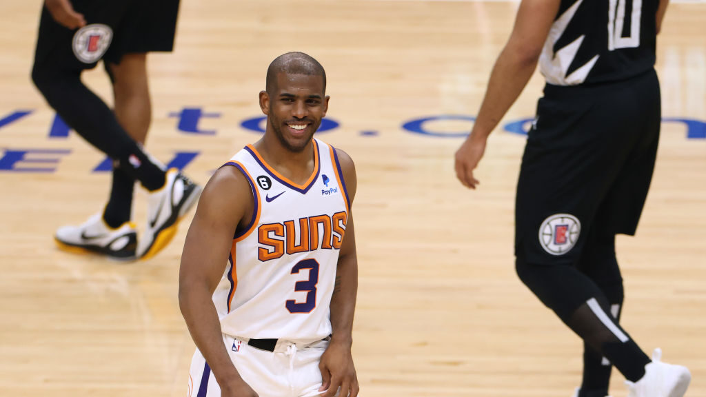 Chris Paul #3 of the Phoenix Suns reacts to his off balance three pointer during a 112-100 Suns win...