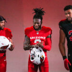 Arizona Cardinals QB Kyler Murray (left) and LB Zaven Collins (right) with WR Hollywood Brown during the team’s uniform unveiling on Thursday, April 20, 2023, in Phoenix (Tyler Drake/Arizona Sports)