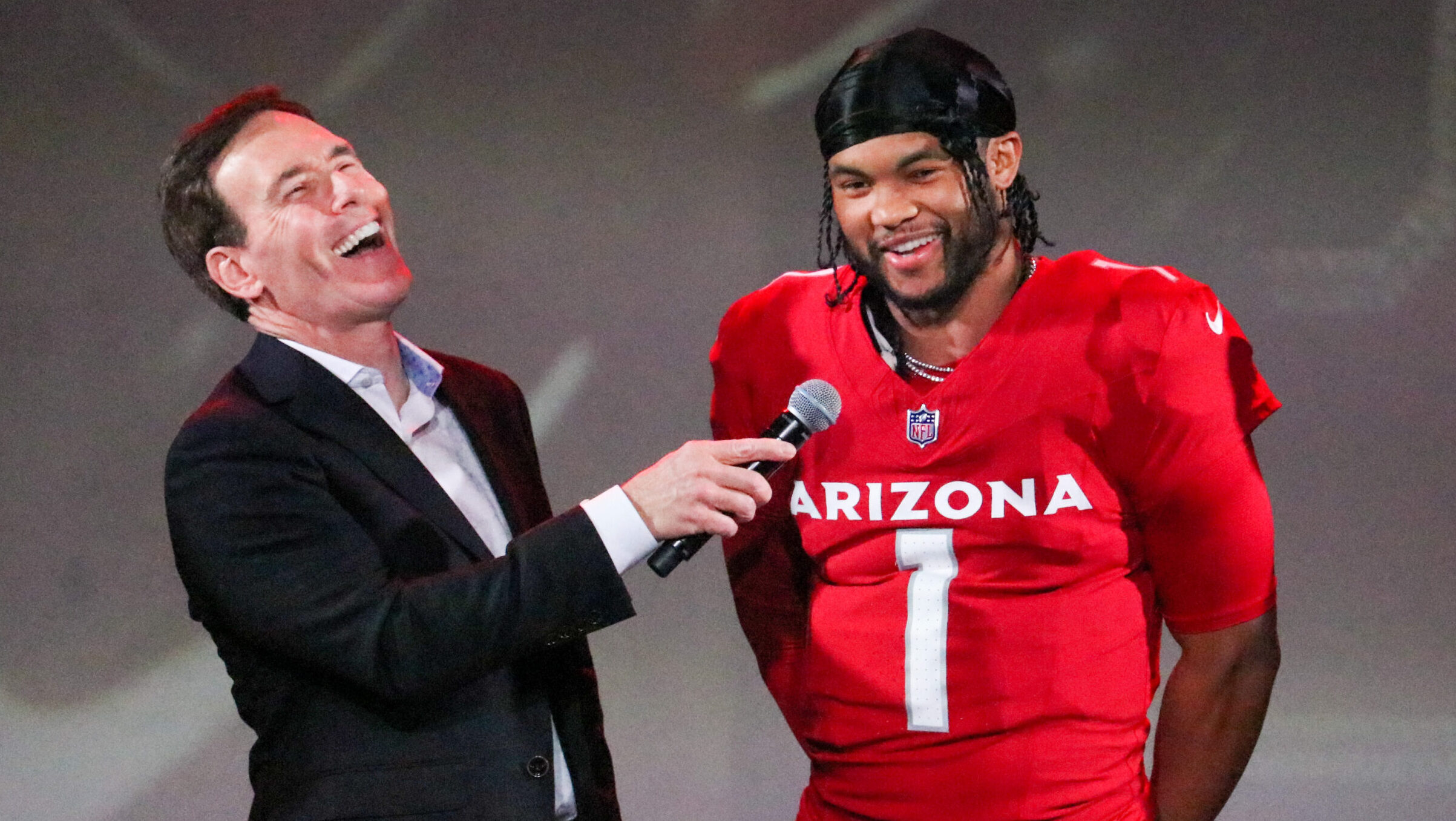 Cardinals QB Kyler Murray chats with sideline reporter Paul Calvisi during the unveiling of Arizona...