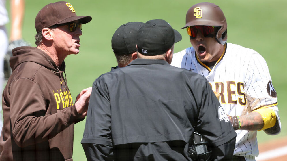 Head coach Bob Melvin argues with umpire Ron Kulpa #46 after Manny Machado #13 of the San Diego Pad...