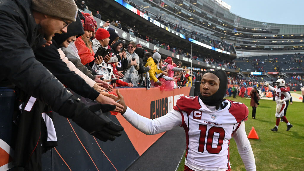 DeAndre Hopkins #10 of the Arizona Cardinals celebrates with fans after Arizona defeated the Chicag...