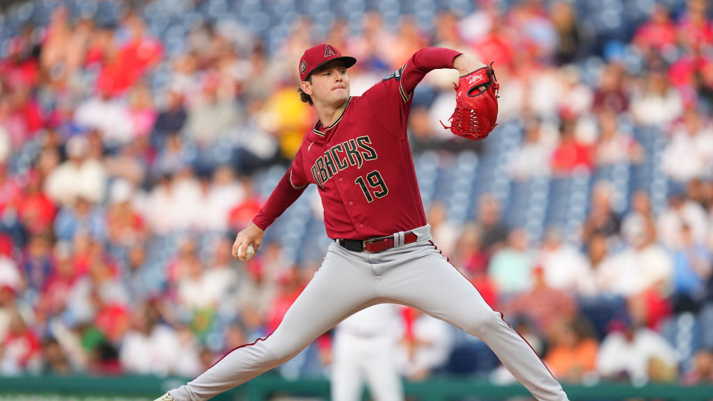 Ryne Nelson #19 of the Arizona Diamondbacks throws a pitch in the bottom of the first inning agains...