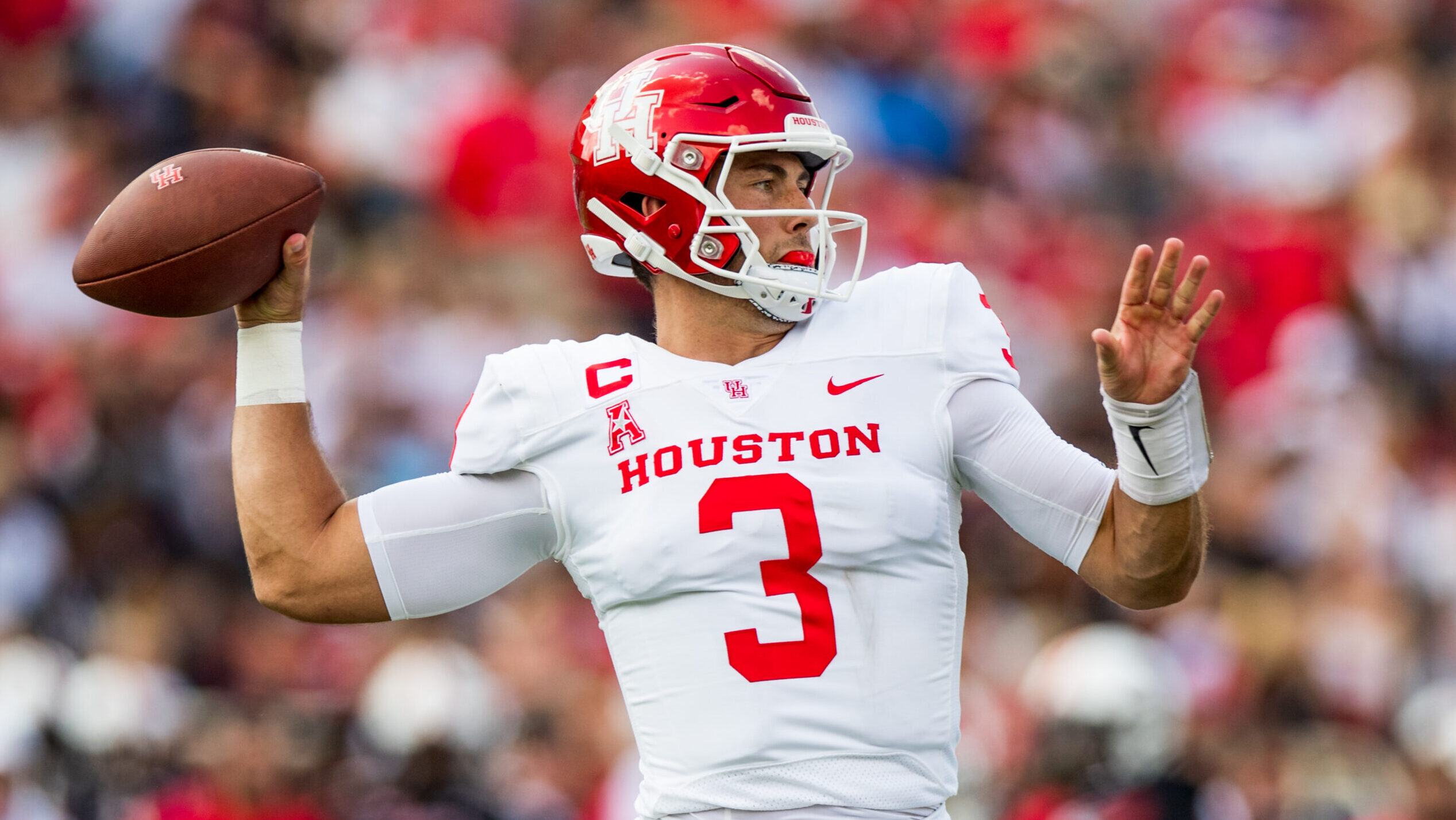 Quarterback Clayton Tune #3 of the Houston Cougars passes the ball during the game against the Texa...