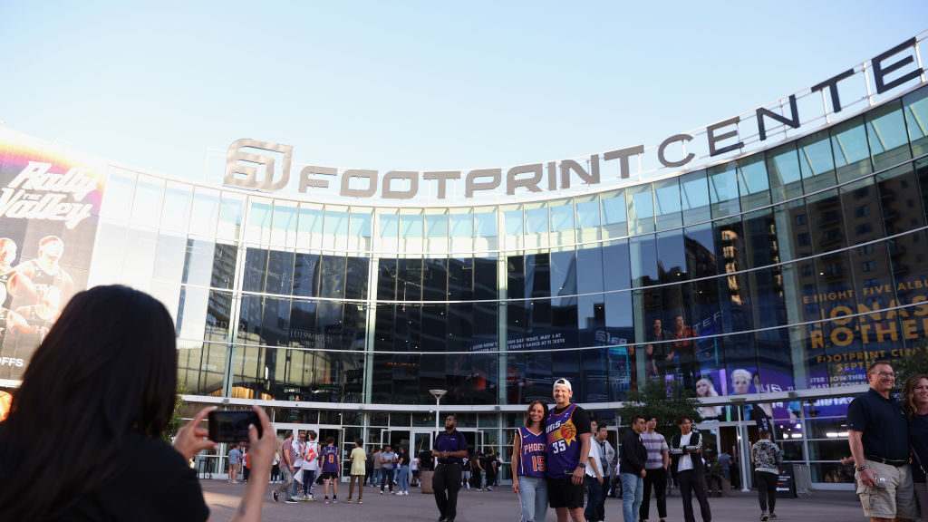 Fans of the Phoenix Suns poses for photos outside of Footprint Center before Game Three of the NBA ...