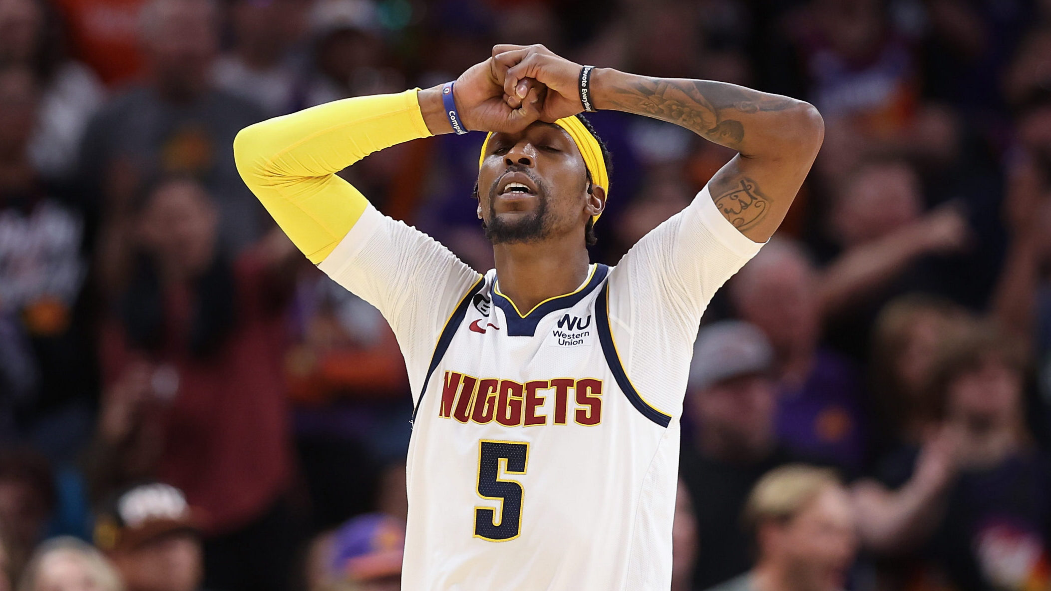 Kentavious Caldwell-Pope #5 of the Denver Nuggets reacts during the second half of Game Four of the...