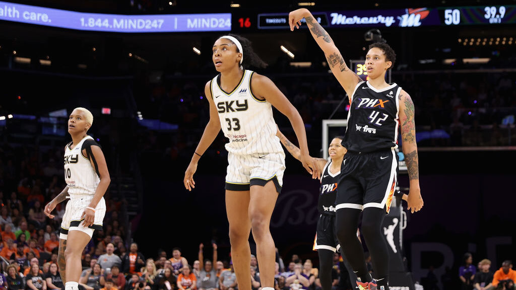 Brittney Griner #42 of the Phoenix Mercury watches a three-point shot against the Chicago Sky durin...