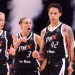 PHOENIX, ARIZONA - MAY 21: (L-R) Sophie Cunningham #9, Diana Taurasi #3, Brittney Griner #42 and Moriah Jefferson #8 of the Phoenix Mercury walk onto the court during the second half of the WNBA game at Footprint Center on May 21, 2023 in Phoenix, Arizona. (Photo by Christian Petersen/Getty Images)