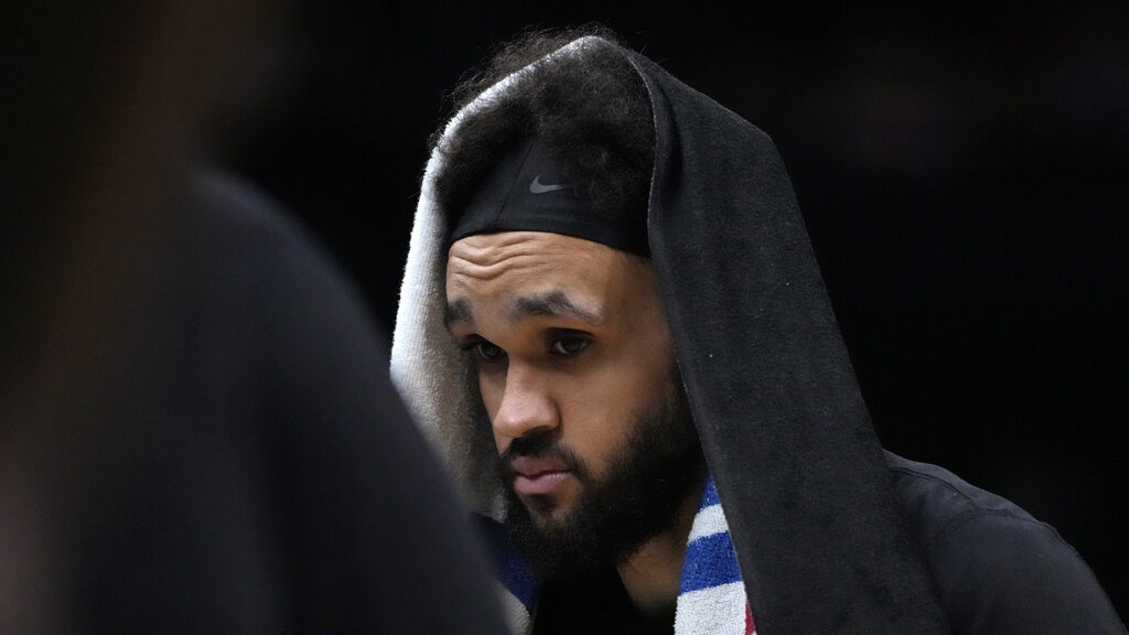 Boston Celtics guard Derrick White walks to the bench after being take out of the game in the closi...