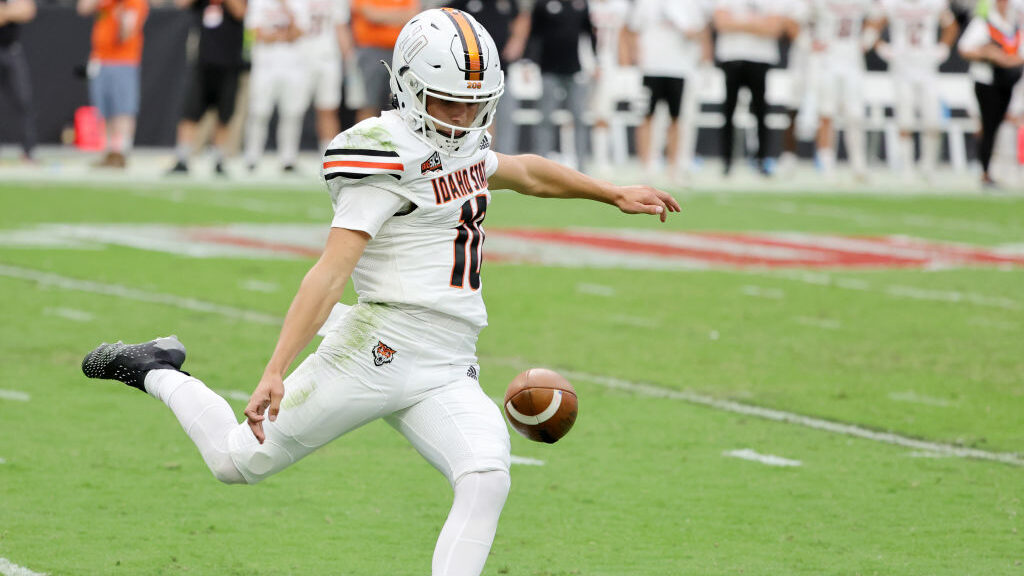 Place kicker Ian Hershey #10 of the Idaho State Bengals gets a nearly mishandled punt off against t...