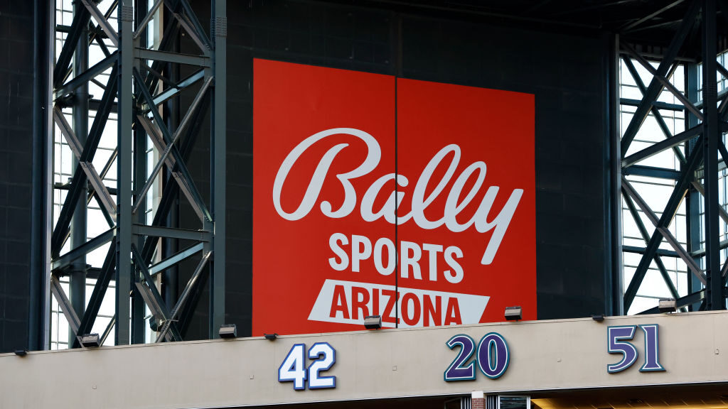 The Bally Sports Arizona logo is seen before the game between the Arizona Diamondbacks and the Colo...