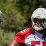 Arizona Cardinals DL Dante Stills chats with L.J. Collier during minicamp on Tuesday, June 13, 2023, in Tempe. (Tyler Drake/Arizona Sports)