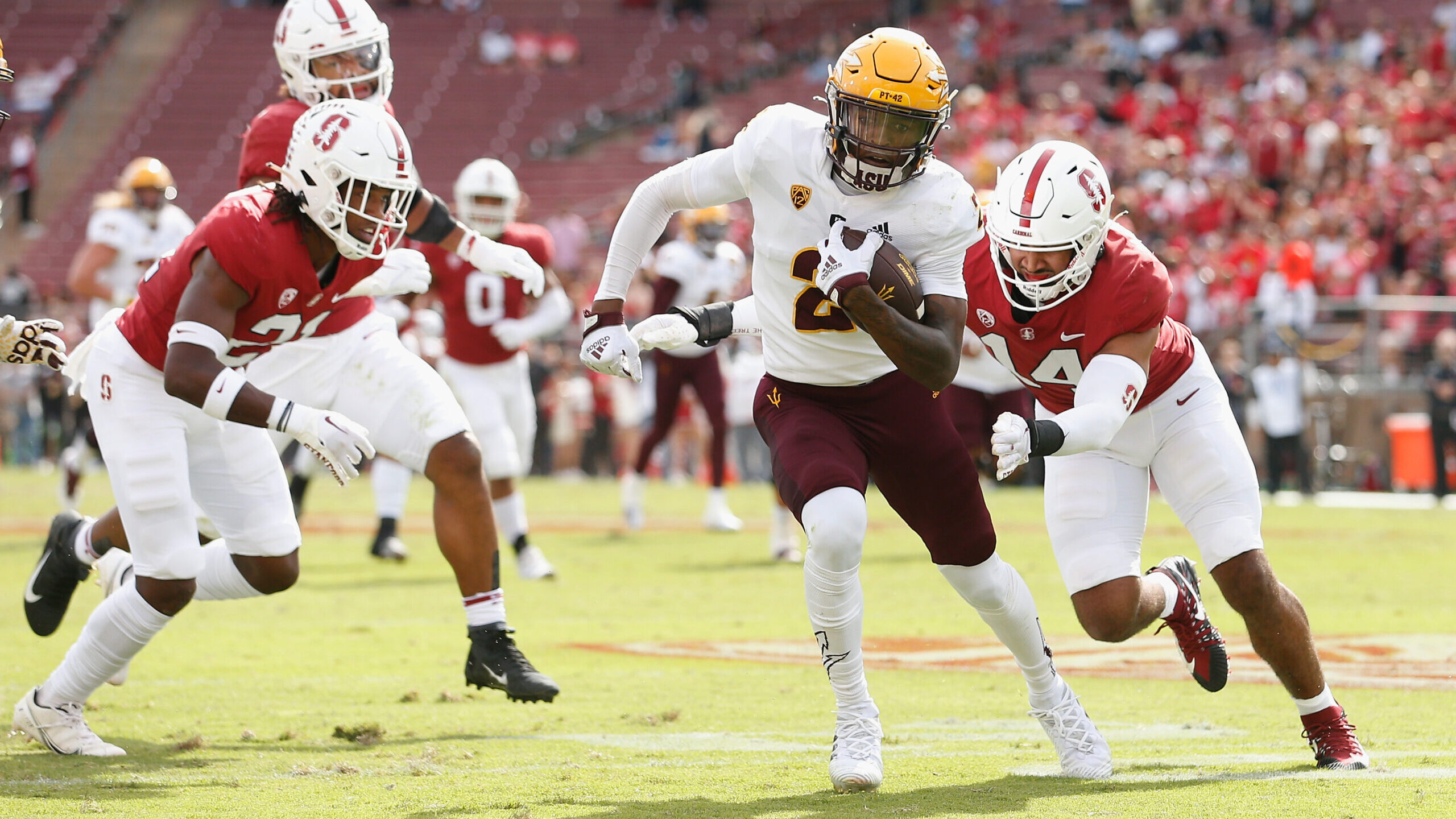 Wide receiver Elijhah Badger #2 of the Arizona State Sun Devils runs with the ball after a catch in...