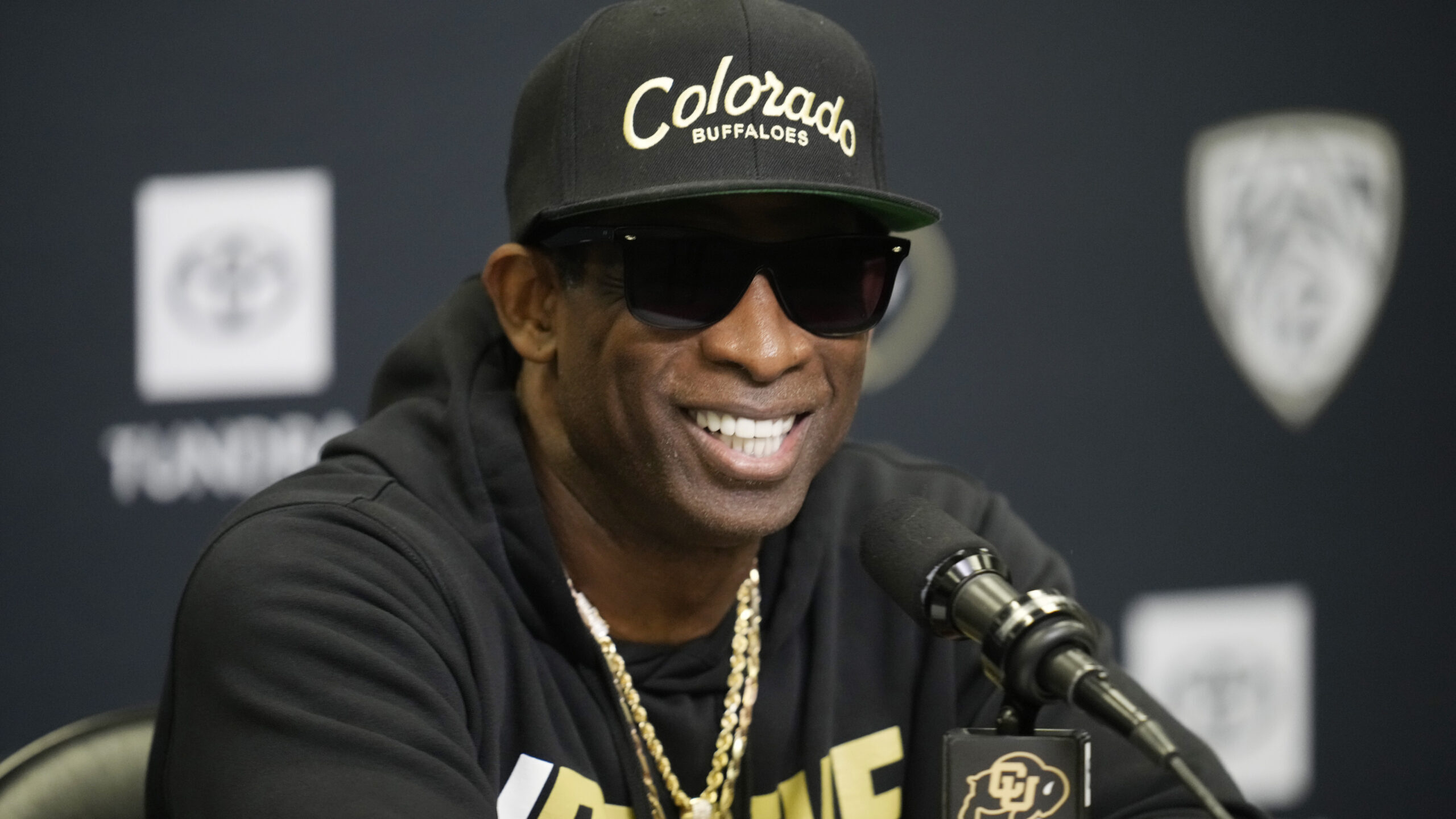 Colorado head coach Deion Sanders responds to questions during a news conference after the team's N...