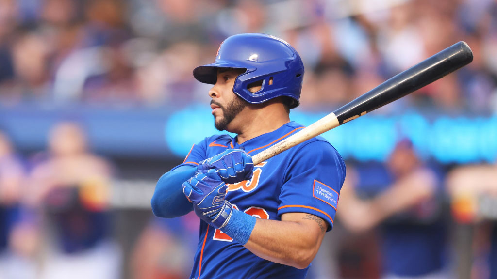 Tommy Pham #28 of the New York Mets hits an RBI double to left field in the first inning against th...