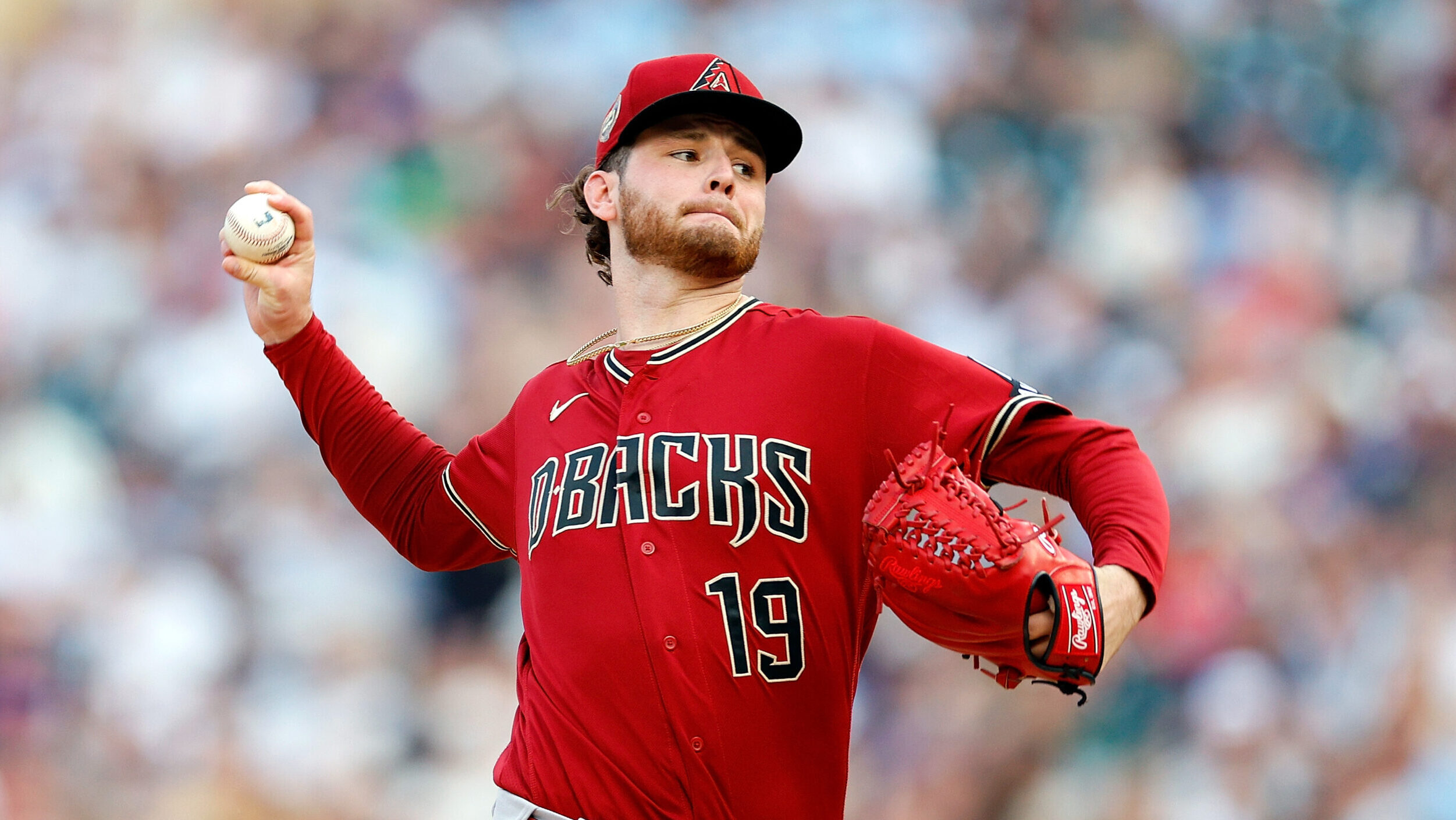 Ryne Nelson #19 of the Arizona Diamondbacks delivers a pitch against the Minnesota Twins in the fir...