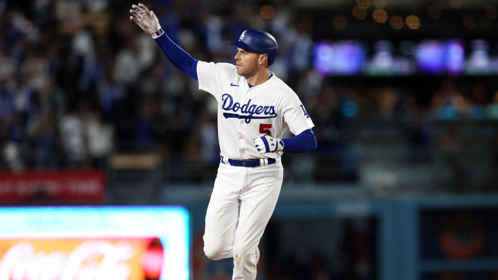 Freddie Freeman #5 of the Los Angeles Dodgers salutes the bullpen as he runs the bases after hittin...