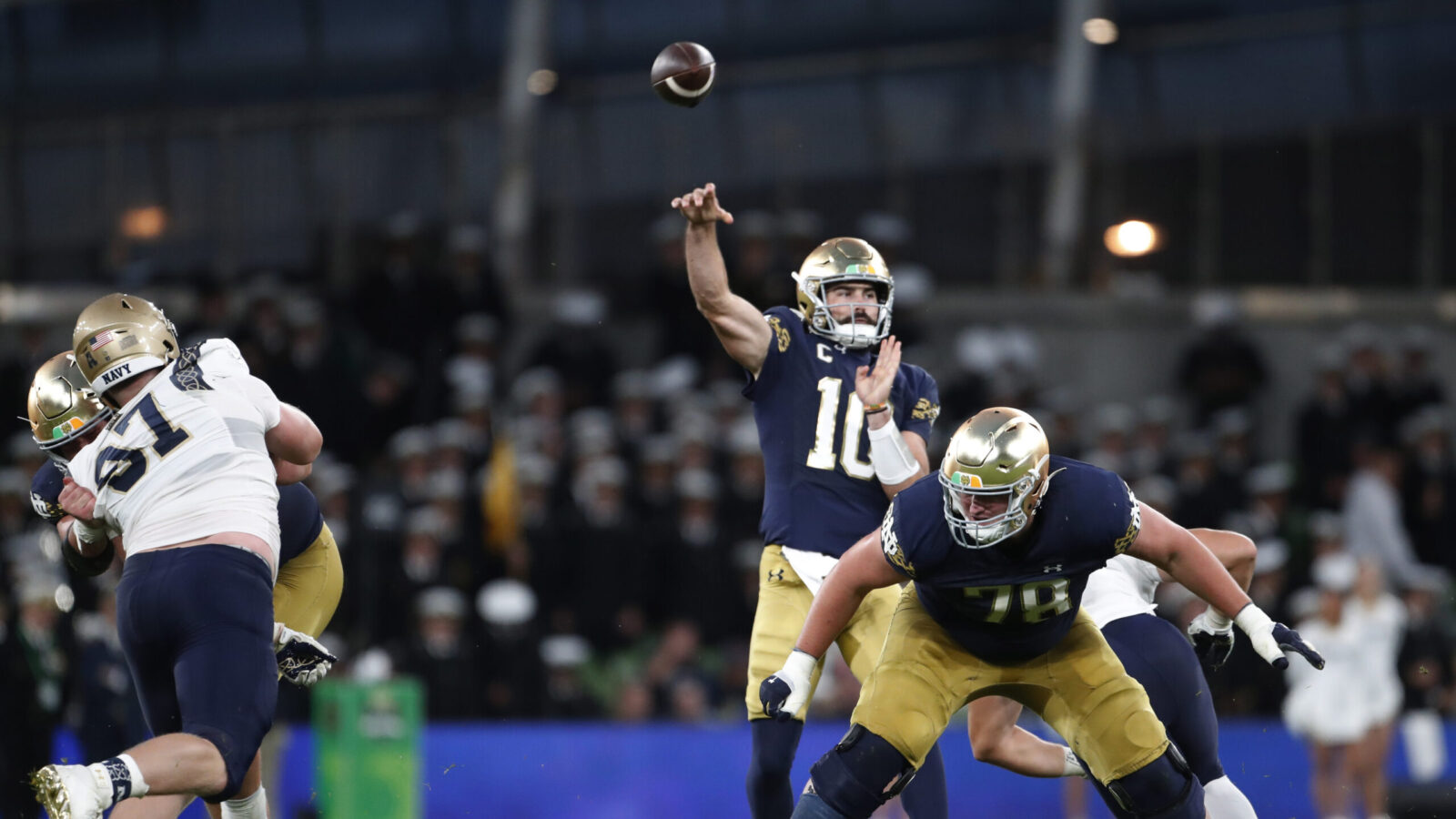 Notre Dame quarterback Sam Hartman (10) throws against Navy during an NCAA college football game in...