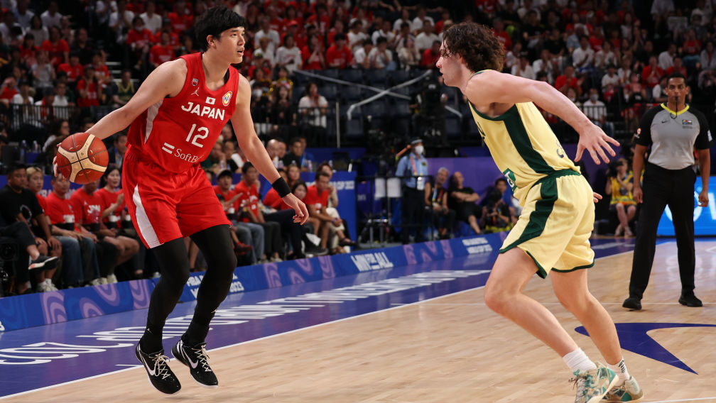 Yuta Watanabe squres up Josh Giddey in Japan vs. Australia of FIBA World Cup play...