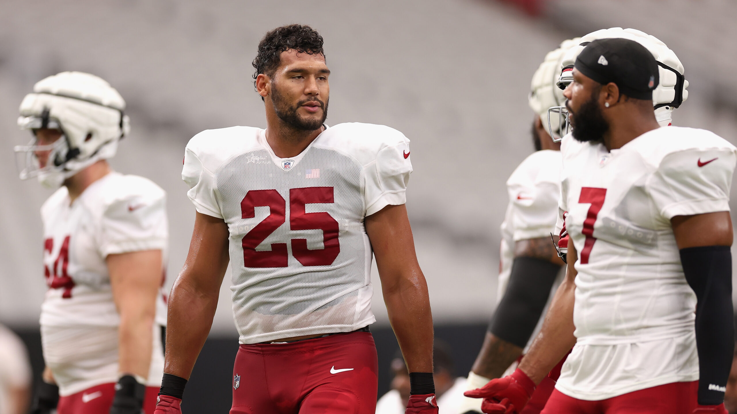 Linebacker Zaven Collins #25 of the Arizona Cardinals participates in a team practice ahead of the ...