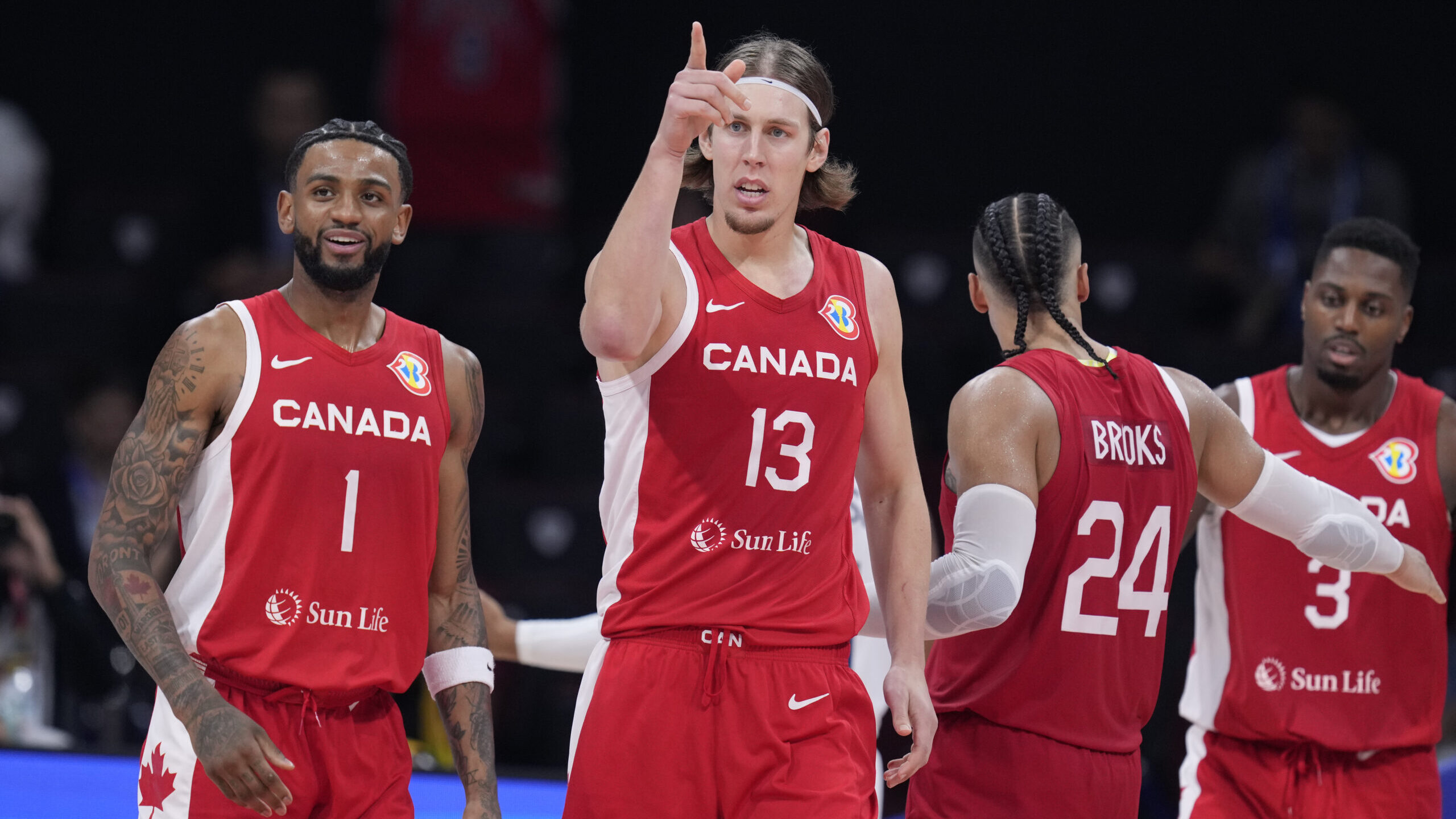 Canada forward Kelly Olynyk (13) gestures during the Basketball World Cup bronze medal game between...
