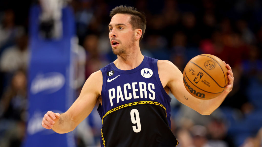 T.J. McConnell #9 of the Indiana Pacers looks to pass during a game  against the Orlando Magic at A...