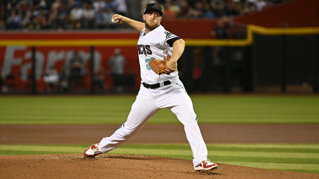 Merrill Kelly #29 of the Arizona Diamondbacks delivers a first inning pitch against the Philadelphi...