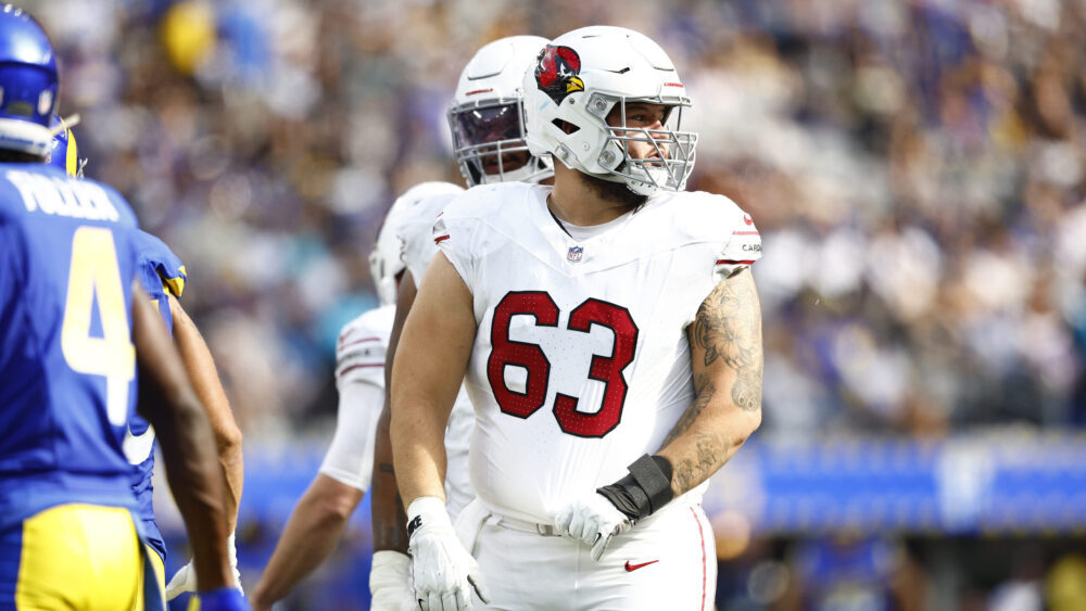 Cardinals G Trystan Colon goes out on 1st drive with knee injury