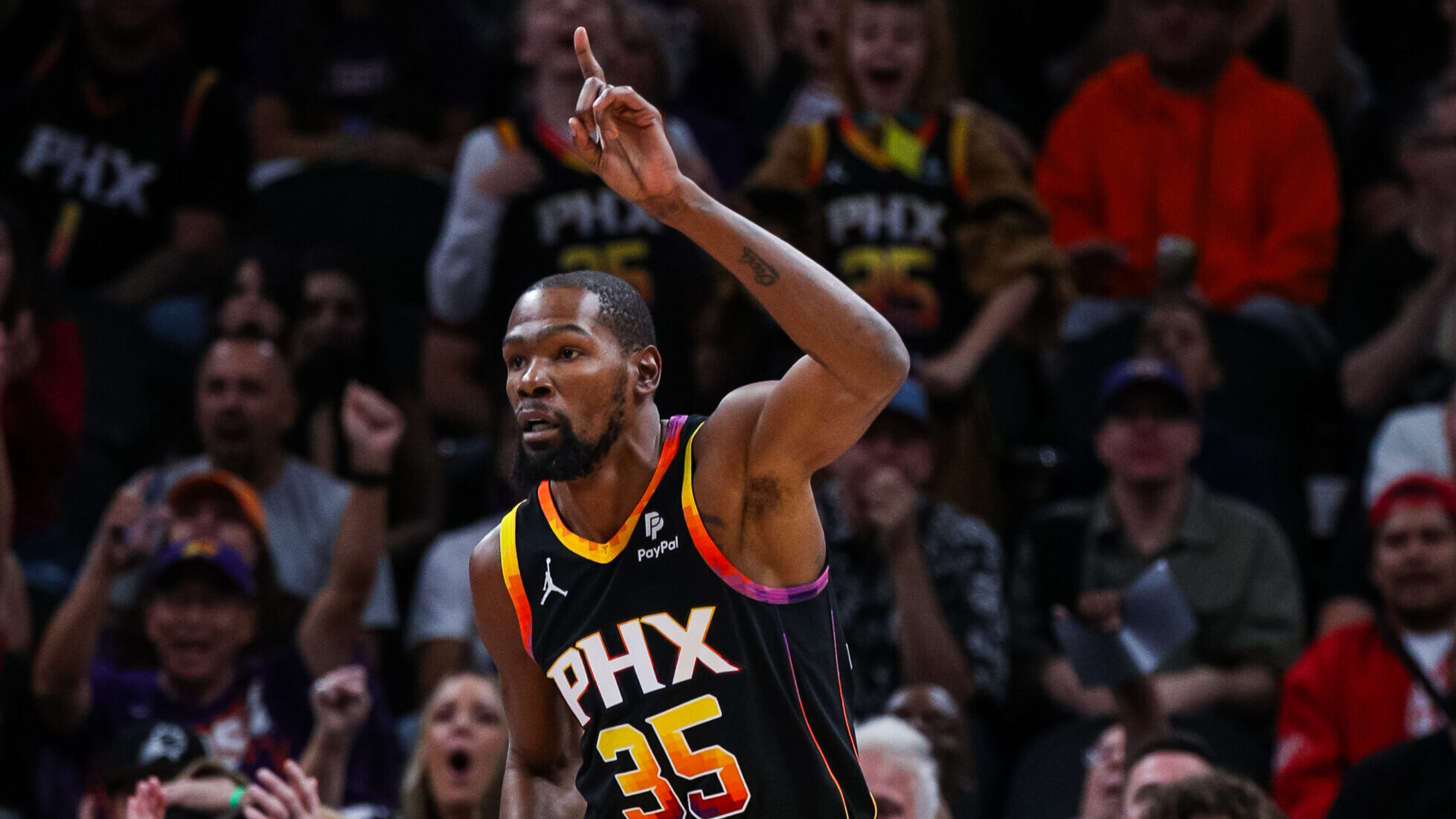 Kevin Durant #35 of the Phoenix Suns celebrates a made basket during the first quarter of an NBA ga...
