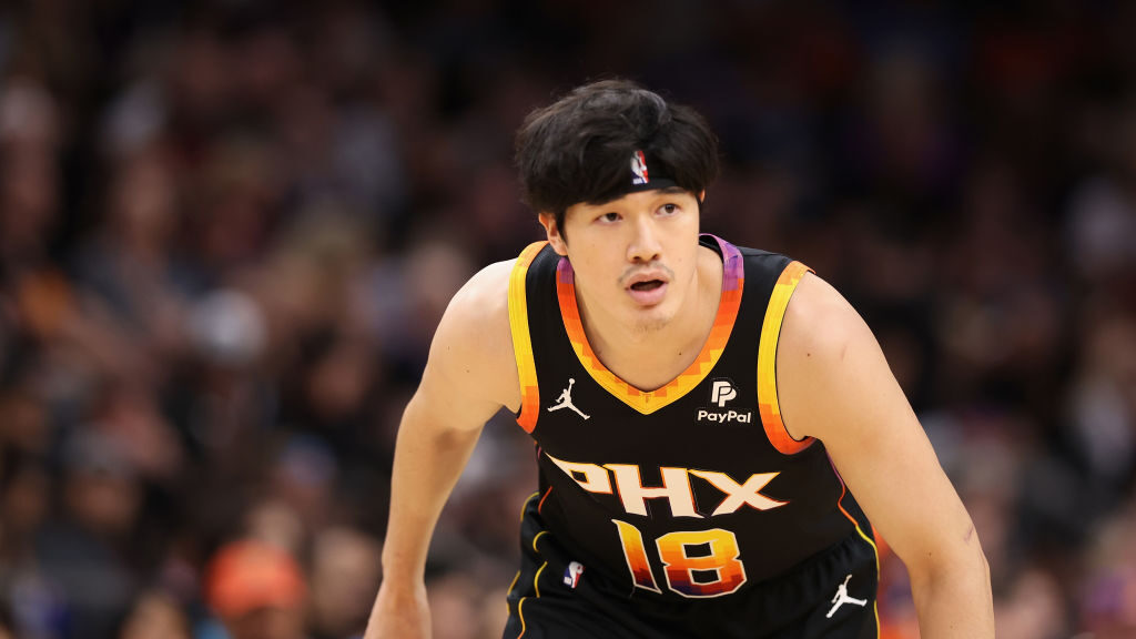 Yuta Watanabe #18 of the Phoenix Suns reacts during the first half of the NBA game against the Minn...