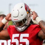 Arizona Cardinals DL Dante Stills adjusts his helmet during practice on Wednesday, Nov. 15, 2023, in Tempe. (Tyler Drake/Arizona Sports)