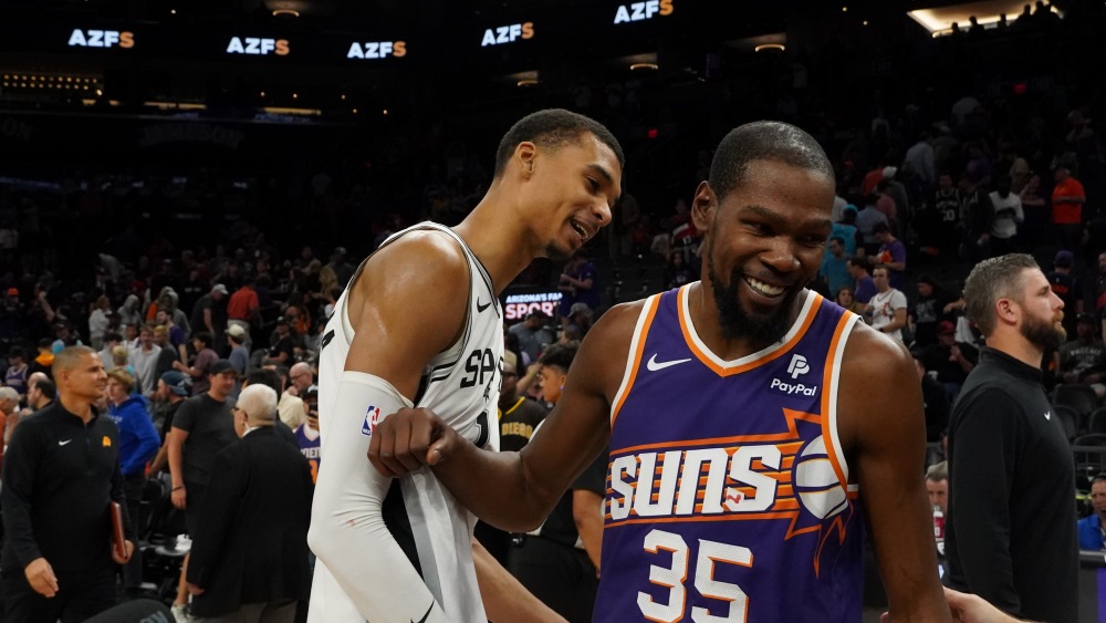 Victor Wembanyama and Kevin Durant postgame after the Spurs beat the Suns on Nov. 2 (Jeremy Schnell...