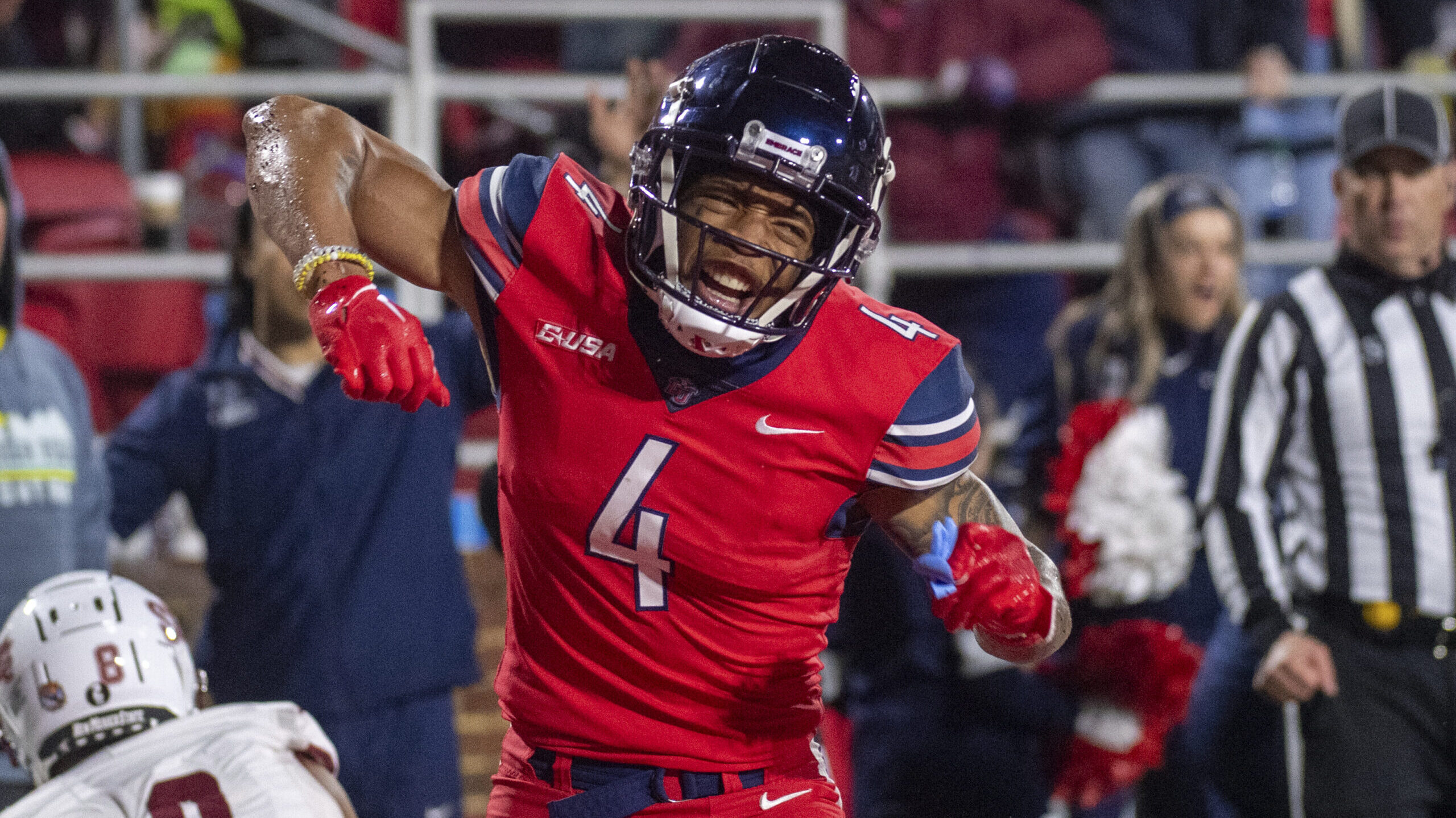 Liberty's CJ Daniels celebrates after a reception against New Mexico State during the second half o...