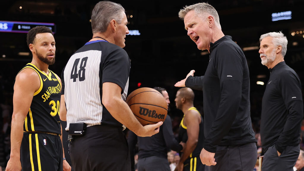 Head coach Steve Kerr of the Golden State Warriors reacts to referee Scott Foster #48 after a techn...