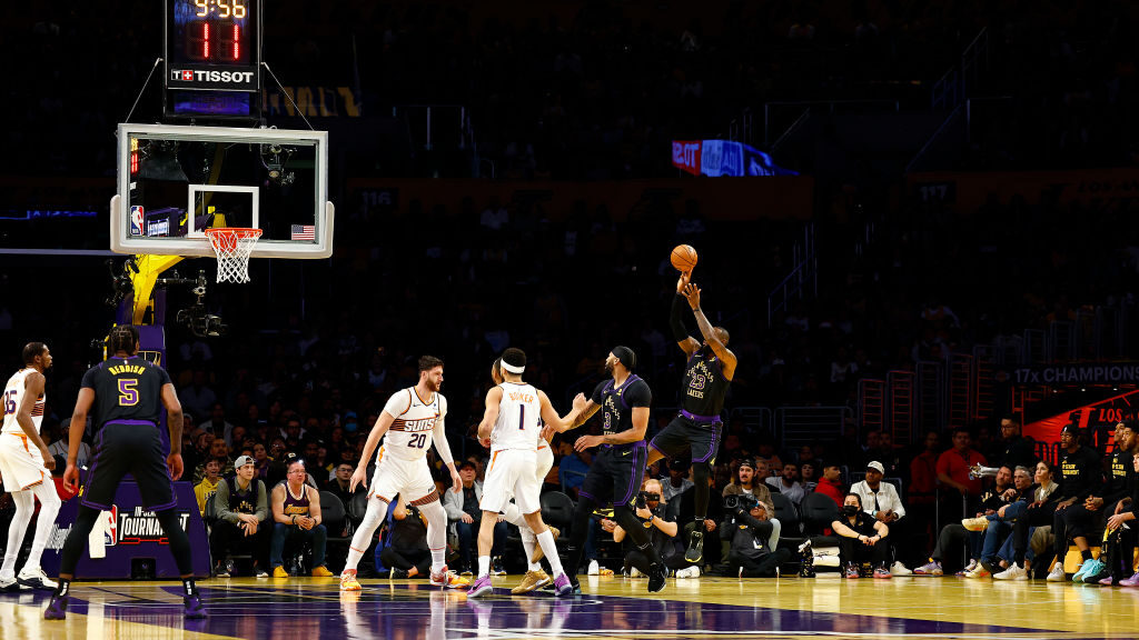 LeBron James #23 of the Los Angeles Lakers takes a shot against the Phoenix Suns in the first half ...