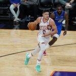 Suns guard Grayson Allen dribbling into the lane (Jeremy Schnell/Arizona Sports)