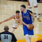 Suns guard Grayson Allen guarding Mavericks guard Luka Doncic (Jeremy Schnell/Arizona Sports)