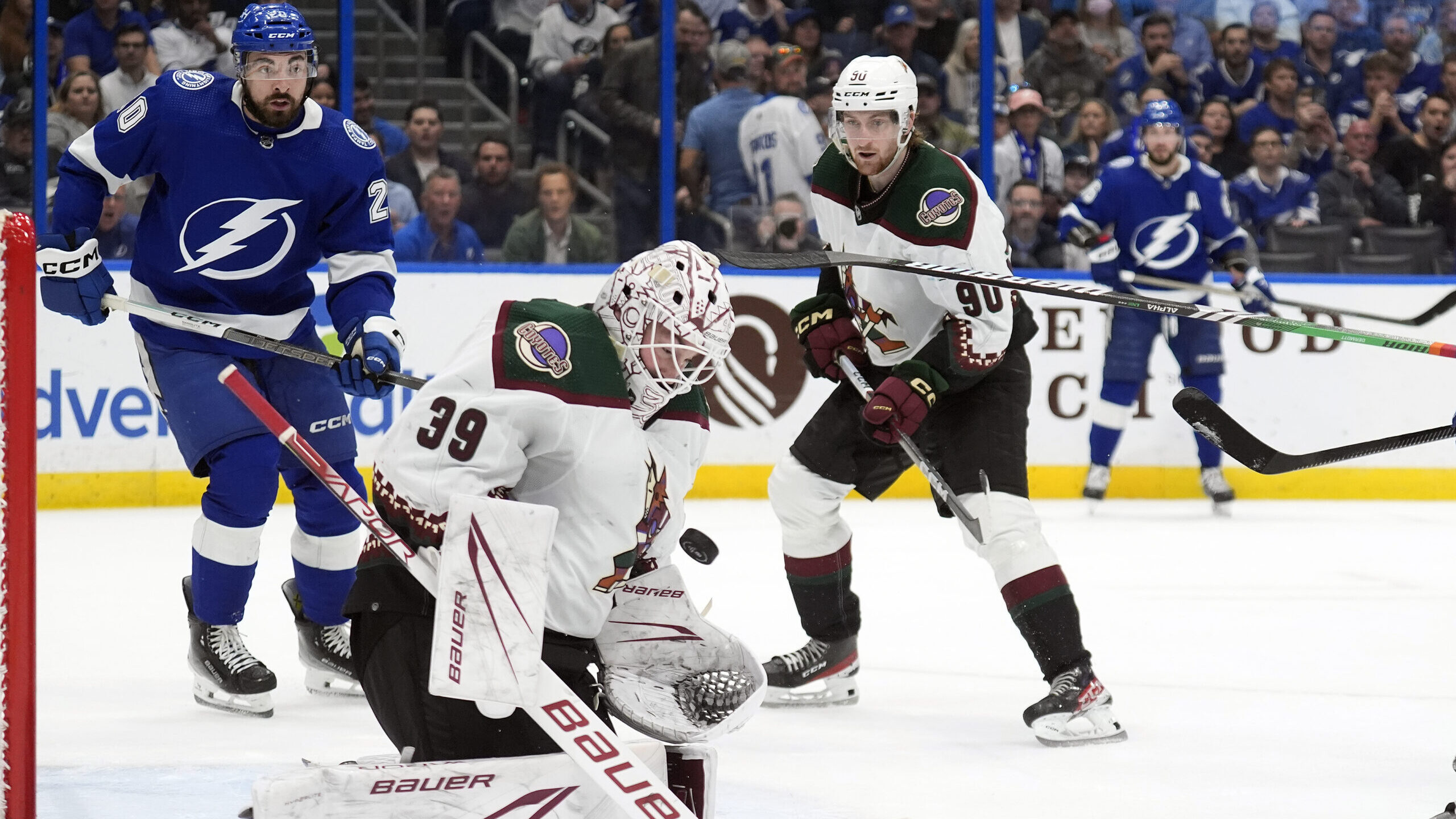 Arizona Coyotes goaltender Connor Ingram (39) makes a save on a shot by the Tampa Bay Lightning dur...