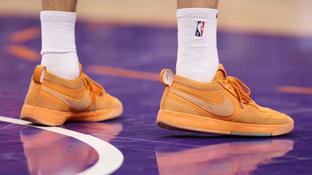 Detail of Nike sneakers worn by Devin Booker #1 of the Phoenix Suns during the NBA game at Footprin...
