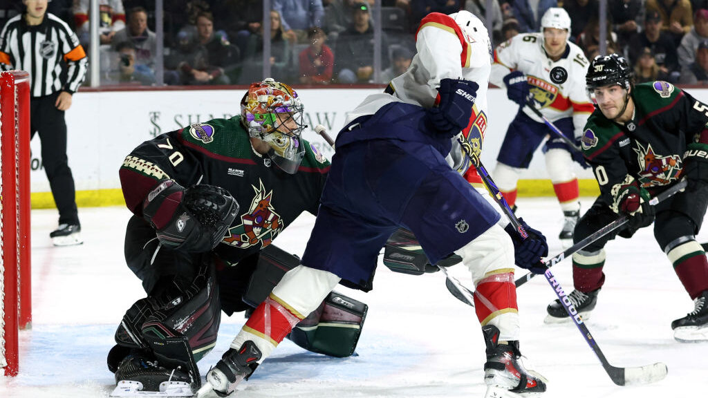 Karel Vejmelka #70 of the Arizona Coyotes makes a save against the Florida Panthers during the thir...