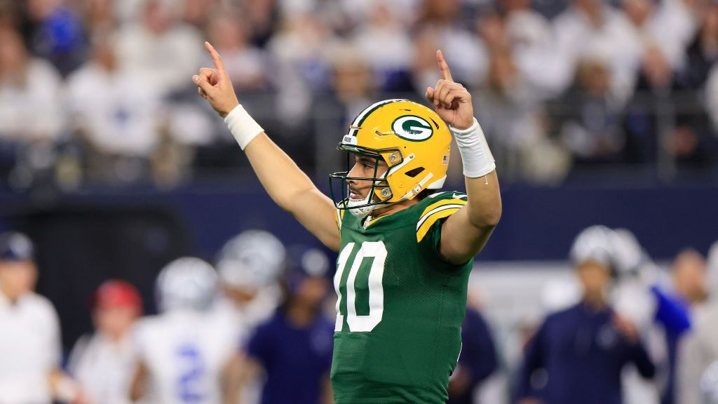 Jordan Love #10 of the Green Bay Packers celebrates a touchdown against the Dallas Cowboys during t...