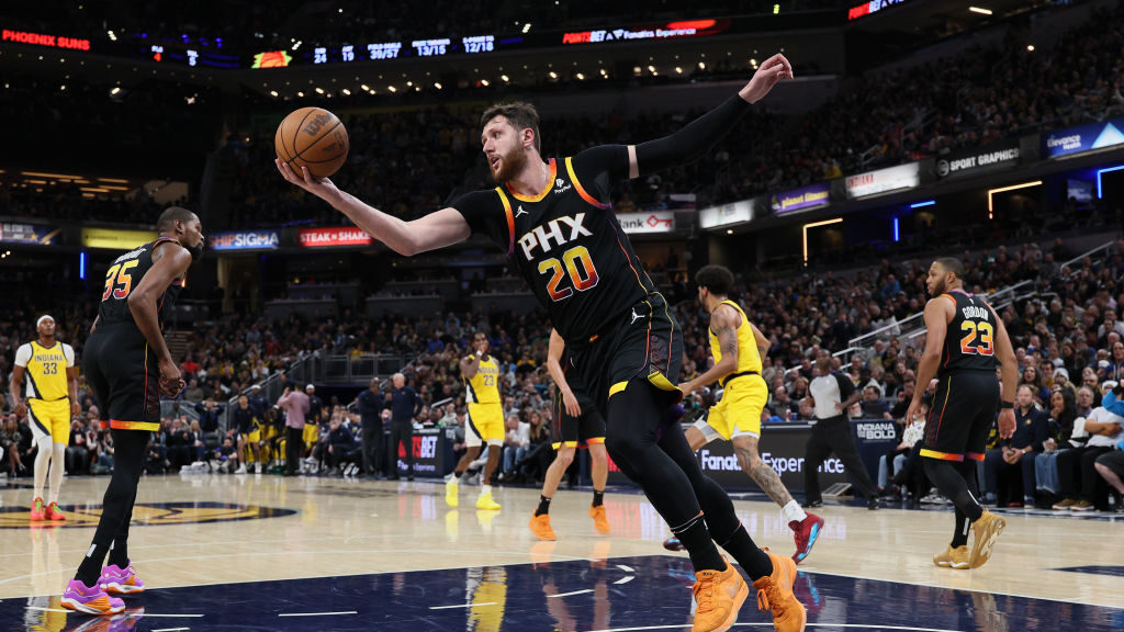 Jusuf Nurkic #20 of the Phoenix Suns grabs a rebound in the game against the Indiana Pacers at Gain...
