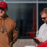 Arizona Cardinals GM Monti Ossenfort and assistant GM Dave Sears chat during practice on Friday, Jan. 5, 2023, in Tempe. (Tyler Drake/Arizona Sports)