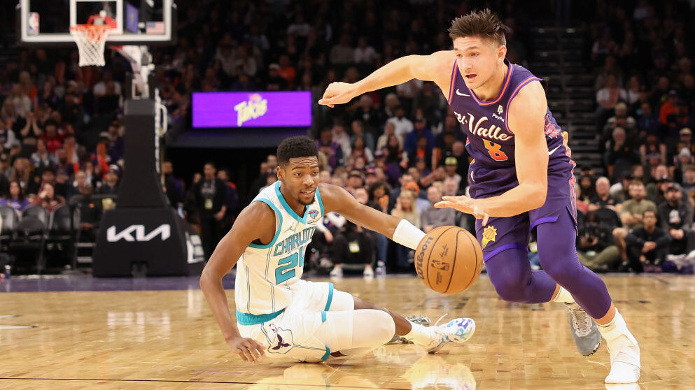Grayson Allen drives against the Hornets in a Suns win...