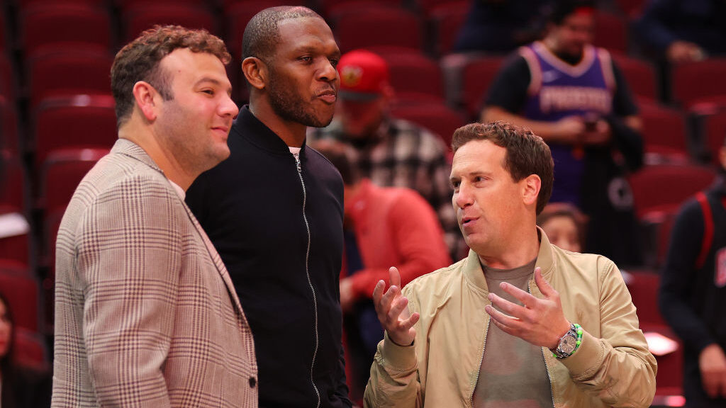 CEO Josh Bartelstein, general manager James Jones, and owner Matt Ishiba of the Phoenix Suns look o...